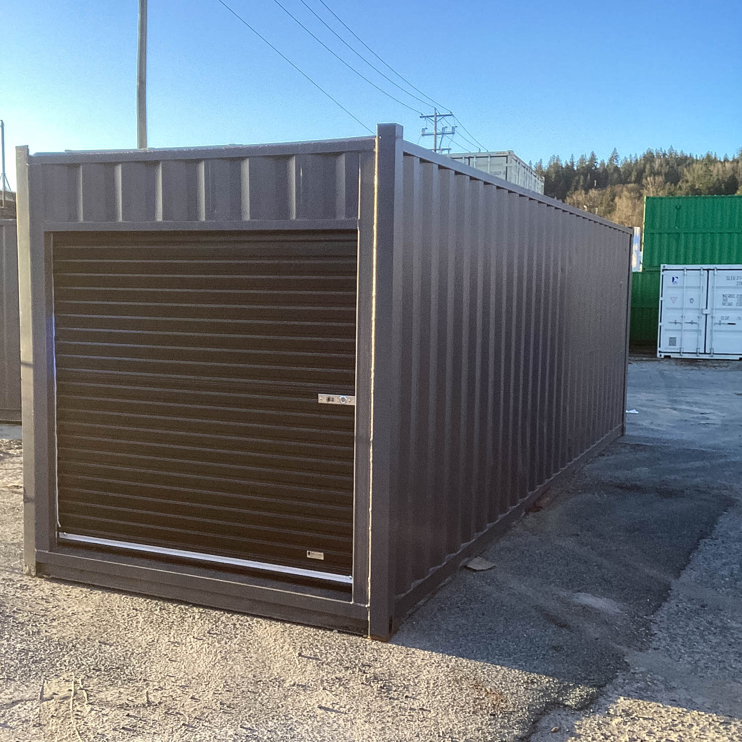 26′ Cut-Down Shipping Container w/Roll-Up Door - Container Systems Australia